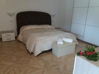 A bed or beds in a room at La valle del re