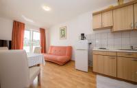 Kuchyňa alebo kuchynka v ubytovaní Apartments Stanicic Kampor