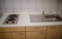 Kuchyňa alebo kuchynka v ubytovaní Apartments Stanicic Kampor