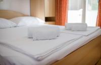 Posteľ alebo postele v izbe v ubytovaní Apartments Stanicic Kampor