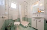 Kúpeľňa v ubytovaní Apartments Stanicic Kampor