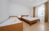 Posteľ alebo postele v izbe v ubytovaní Apartments Stanicic Kampor