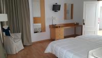 Postel nebo postele na pokoji v ubytování Nuevo Hotel Vista Alegre