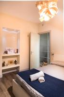 Posteľ alebo postele v izbe v ubytovaní Cosy en ville apartment in Aosta center