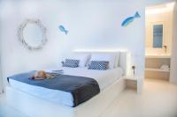 Posteľ alebo postele v izbe v ubytovaní Mando Pool Villas w Sea Views - Five Bedrooms