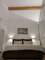 Posteľ alebo postele v izbe v ubytovaní River Inn Arco