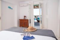 Posteľ alebo postele v izbe v ubytovaní Mando Pool Villas w Sea Views - Five Bedrooms
