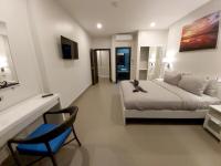 TV a/nebo společenská místnost v ubytování The Pearl Luxury Pool Villas