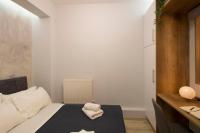 Posteľ alebo postele v izbe v ubytovaní InCityBnB - Chic Suite