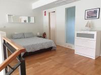 Postel nebo postele na pokoji v ubytování Cozy Loft in Tres Cantos, 20 min to Madrid