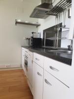 Kuchyň nebo kuchyňský kout v ubytování Cozy Loft in Tres Cantos, 20 min to Madrid