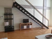 TV a/nebo společenská místnost v ubytování Cozy Loft in Tres Cantos, 20 min to Madrid