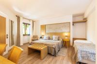 A bed or beds in a room at Costa Dorada