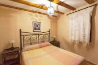 A bed or beds in a room at Villa Loaisa