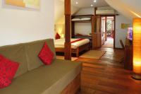 Ein Bett oder Betten in einem Zimmer der Unterkunft Sok San Beach Resort