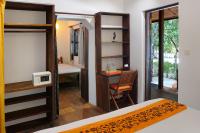 Ein Bett oder Betten in einem Zimmer der Unterkunft Sok San Beach Resort
