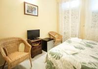 A bed or beds in a room at Argentiere Room Apartments