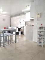 A kitchen or kitchenette at Ocean View Elegant Magic Apartment