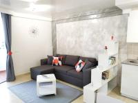 A seating area at Ocean View Elegant Magic Apartment
