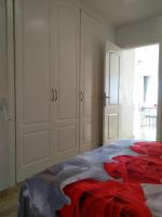 A bed or beds in a room at Ocean View Elegant Magic Apartment