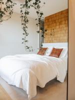 Posteľ alebo postele v izbe v ubytovaní Concorde Silesian Place Apartments