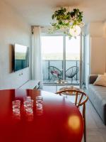 Televízia a/alebo spoločenská miestnosť v ubytovaní Concorde Silesian Place Apartments