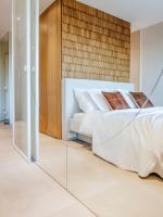 Posteľ alebo postele v izbe v ubytovaní Concorde Silesian Place Apartments
