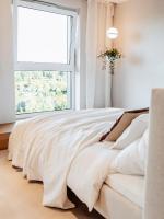 Posteľ alebo postele v izbe v ubytovaní Concorde Silesian Place Apartments