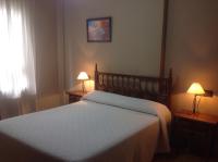 Posteľ alebo postele v izbe v ubytovaní Hostal Argentino
