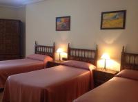 Posteľ alebo postele v izbe v ubytovaní Hostal Argentino