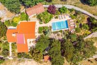 an overhead view of a house with a swimming pool at Villa Tajina Kuca in Žeževica
