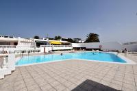 Bazén v ubytování Colina del Sol Lanzarote Pool with sea view nebo v jeho okolí