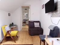 Telewizja i/lub zestaw kina domowego w obiekcie Apartamenty na Piątkę