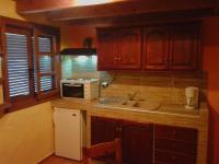 Kuchyň nebo kuchyňský kout v ubytování Sunrise Apartments