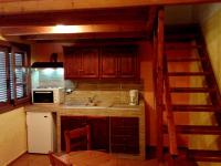Kuchyň nebo kuchyňský kout v ubytování Sunrise Apartments