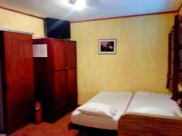 Postel nebo postele na pokoji v ubytování Sunrise Apartments