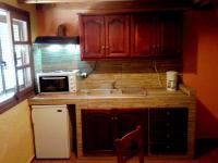 Kuchyň nebo kuchyňský kout v ubytování Sunrise Apartments