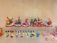 a group of toy figurines on a shelf at Doll House Lodge in Hengchun South Gate