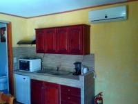 Kuchyň nebo kuchyňský kout v ubytování Sunrise Apartments