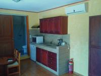 Kuchyň nebo kuchyňský kout v ubytování Sunrise Apartments