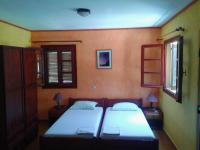 Postel nebo postele na pokoji v ubytování Sunrise Apartments