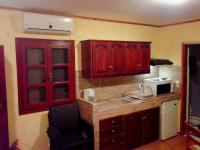 Kuchyň nebo kuchyňský kout v ubytování Sunrise Apartments