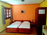 Postel nebo postele na pokoji v ubytování Sunrise Apartments