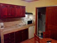 Kuchyň nebo kuchyňský kout v ubytování Sunrise Apartments