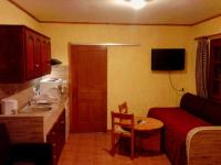 Kuchyň nebo kuchyňský kout v ubytování Sunrise Apartments