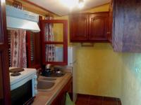 Kuchyň nebo kuchyňský kout v ubytování Sunrise Apartments