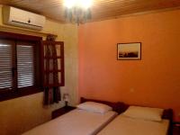 Postel nebo postele na pokoji v ubytování Sunrise Apartments