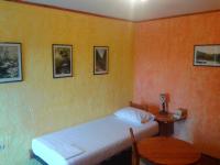 Postel nebo postele na pokoji v ubytování Sunrise Apartments
