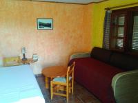 Postel nebo postele na pokoji v ubytování Sunrise Apartments