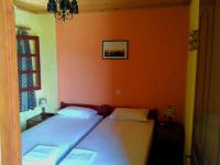 Postel nebo postele na pokoji v ubytování Sunrise Apartments